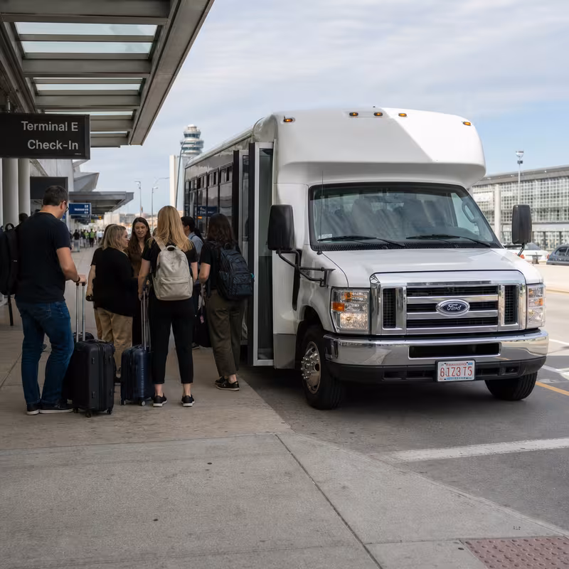 Black Mercedes Sprinter van staged for an Boston Airport Transportation group
